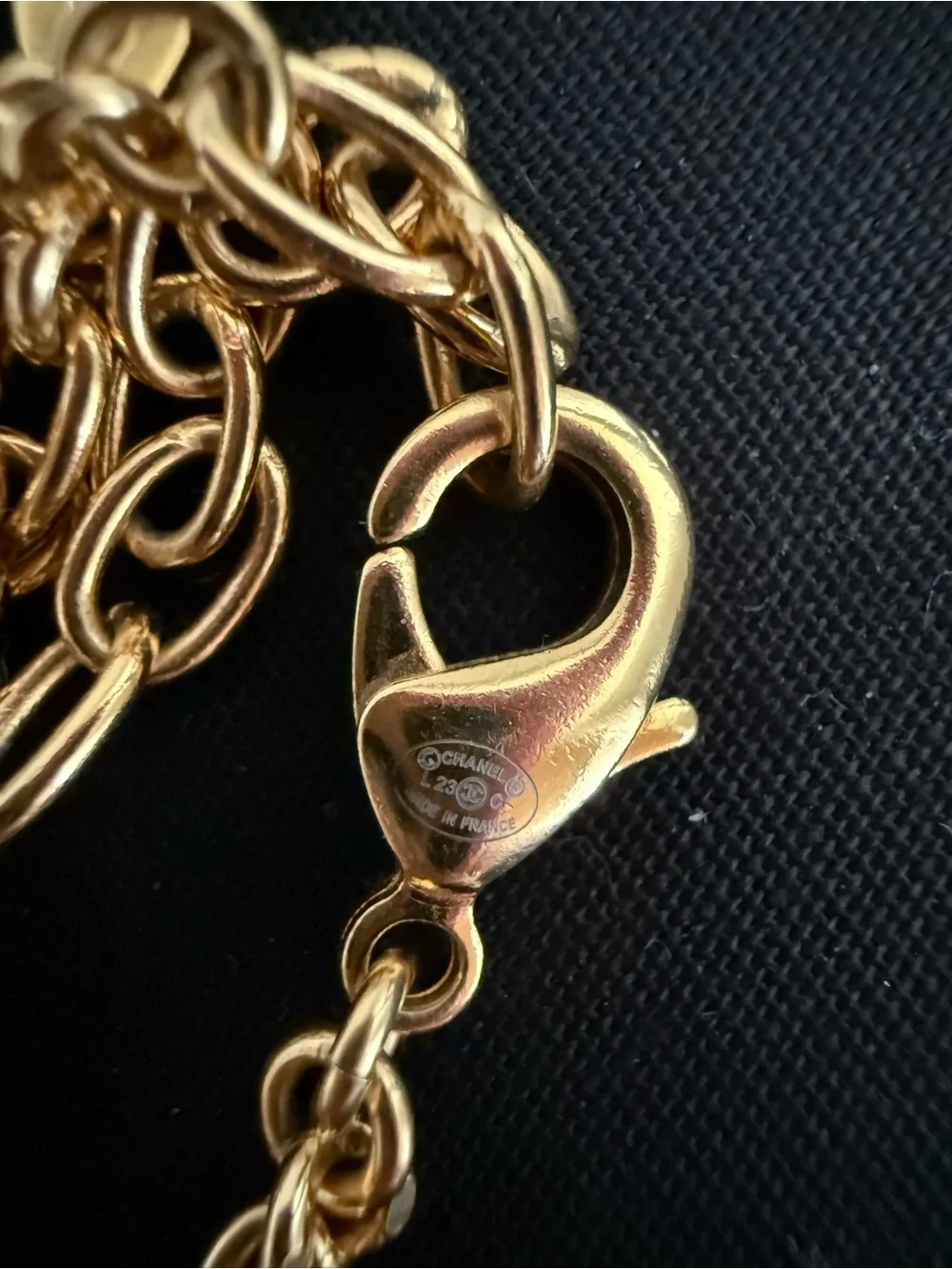 CHANEL gold tone